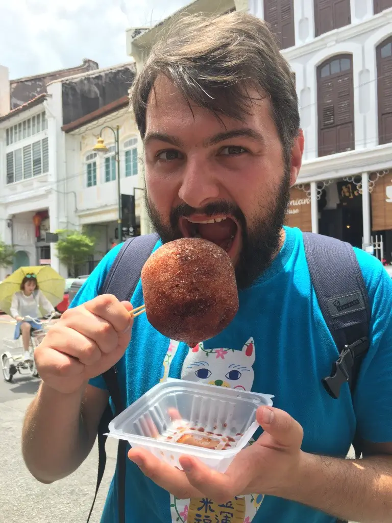 Tucking into a retro ice ball in Armenian Street, Penang