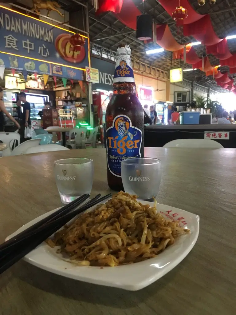 char kway teow with cold beers in Penang