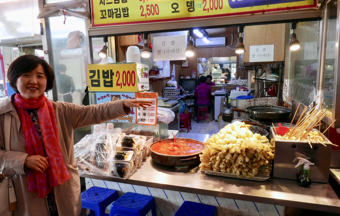 Ann showing us around the market on our Korean cooking experience 