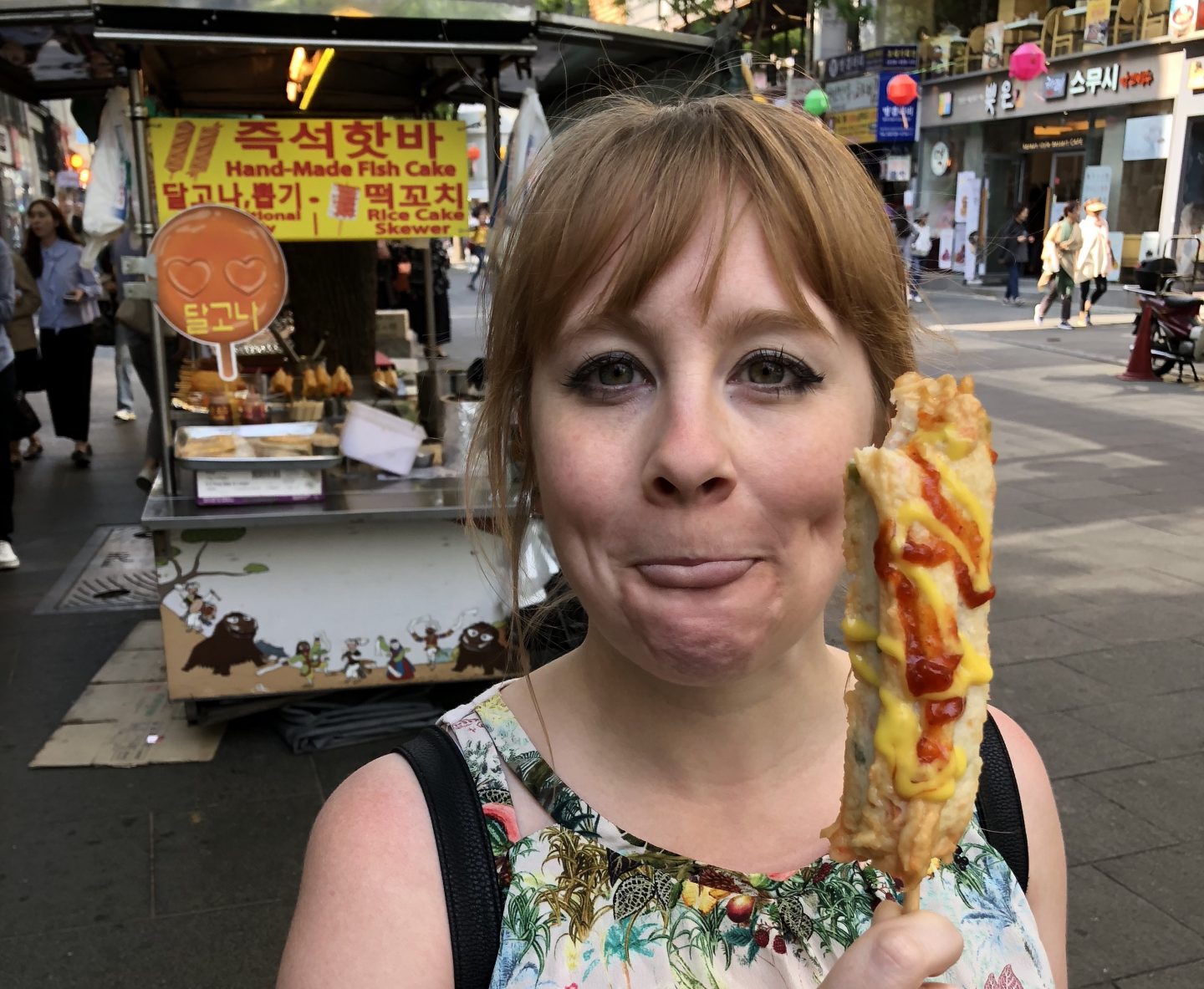 Gingey Bites eating Seoul street food on sticks