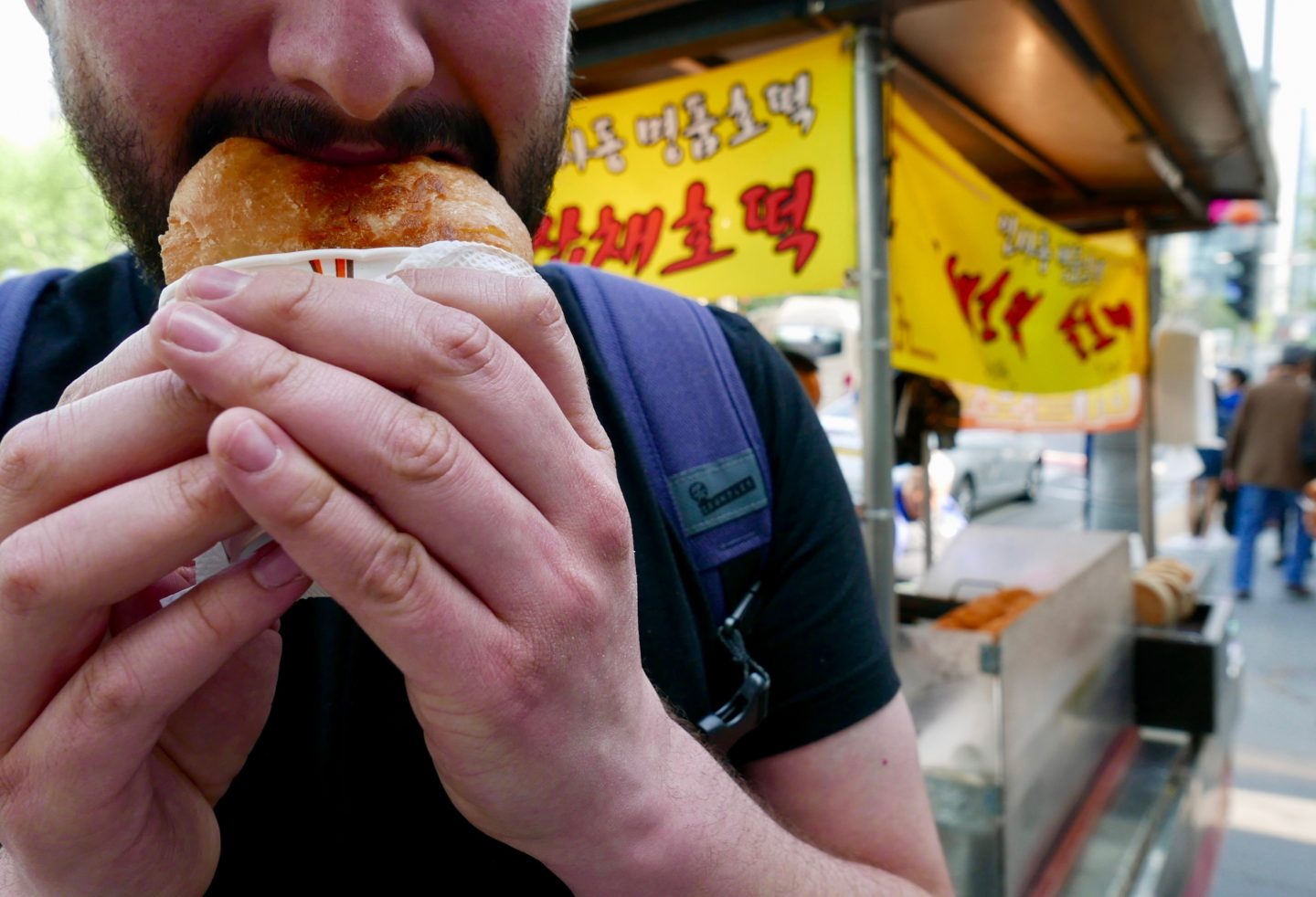 Tucking into a Hoddeok in Seoul