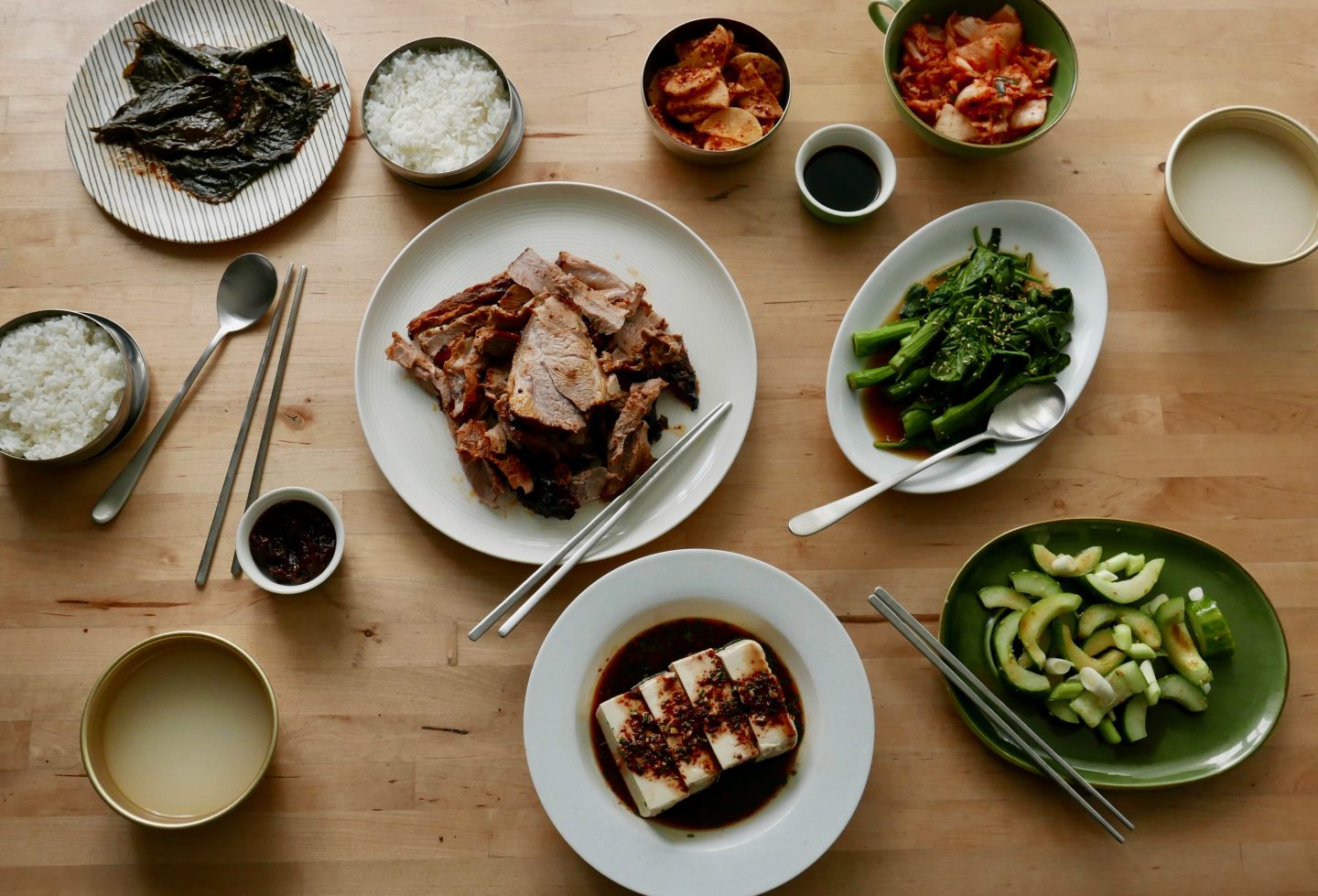 Korean Style Welsh Lamb with Banchan on the table