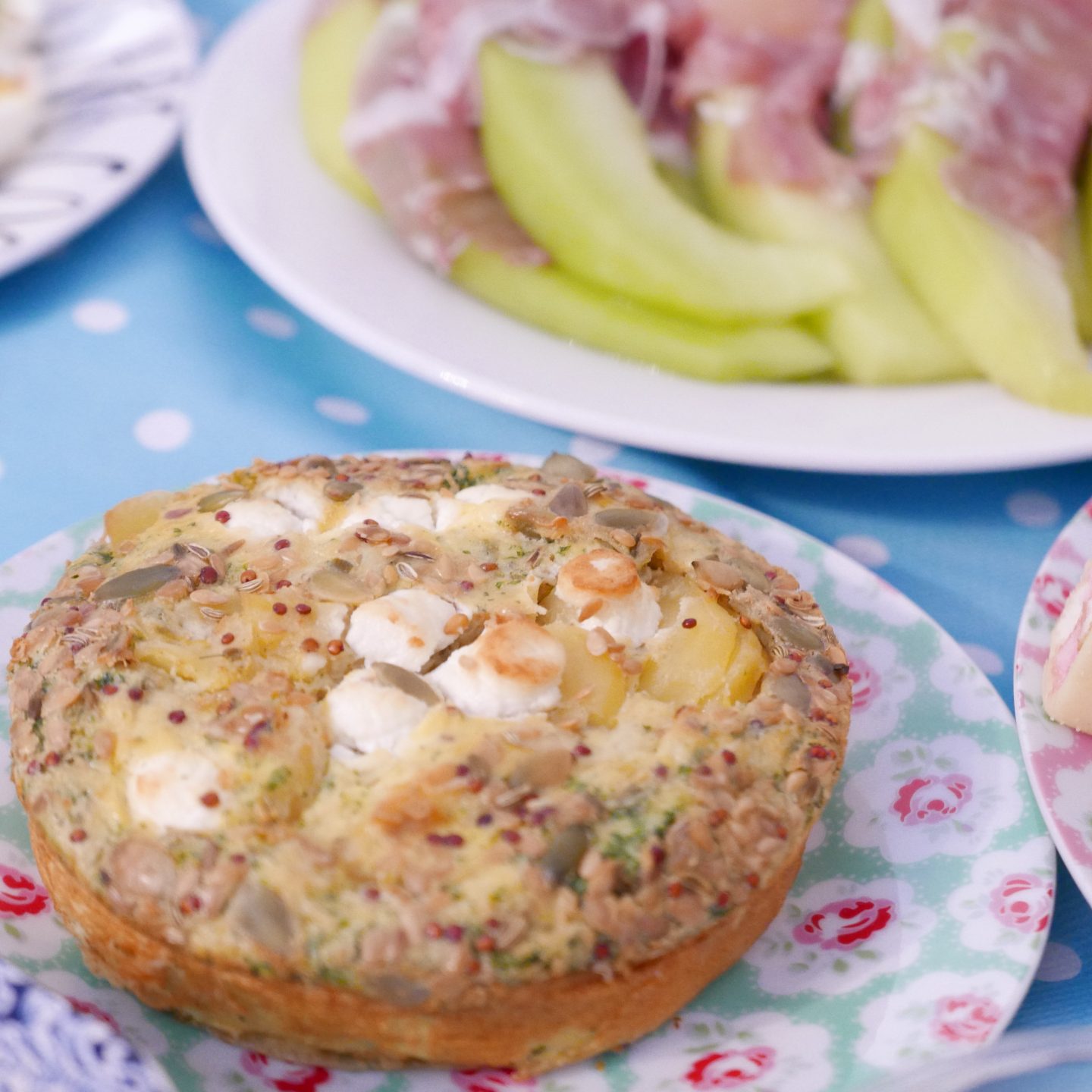 Quiche and melon with parma ham