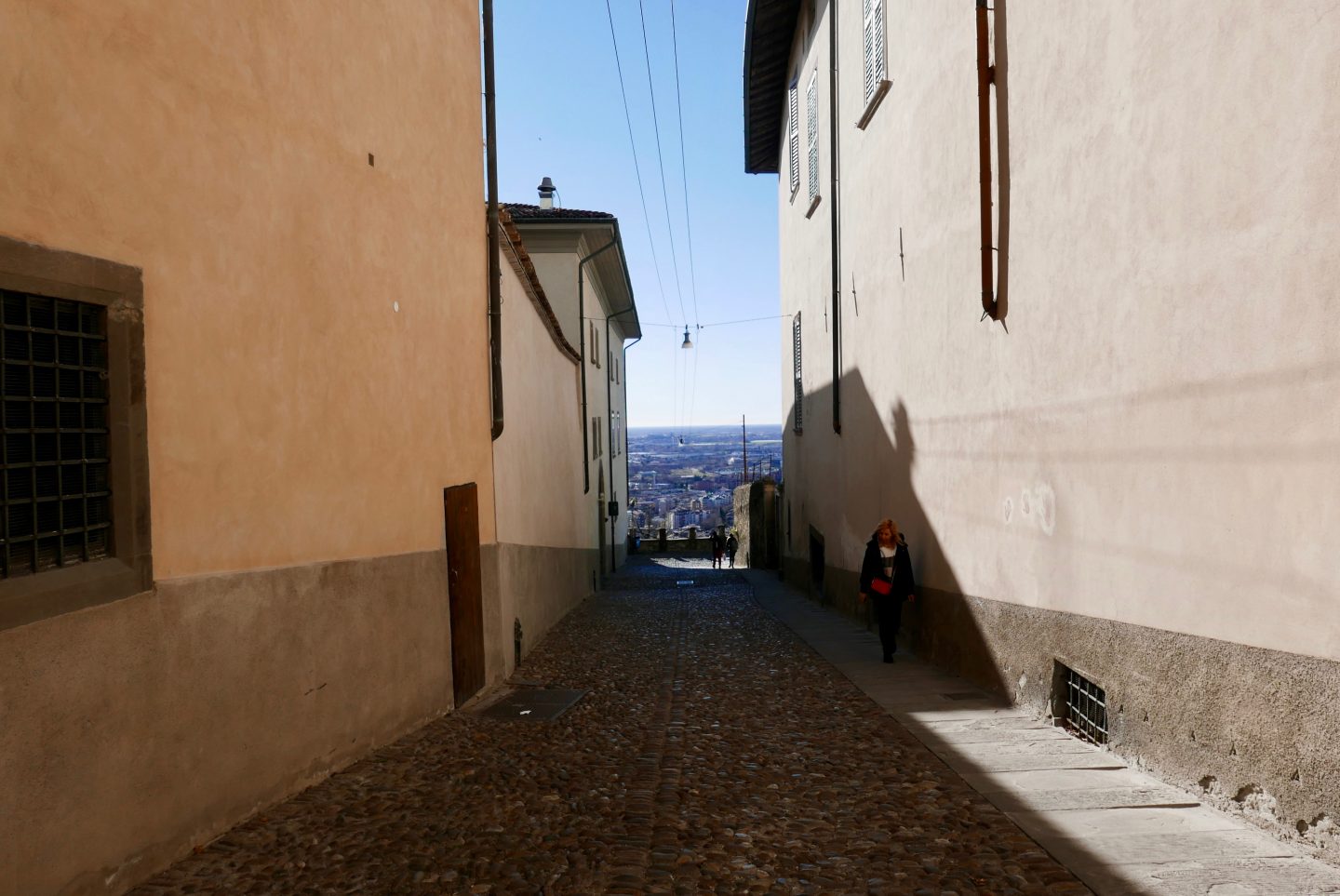 Bergamo with a view down a street