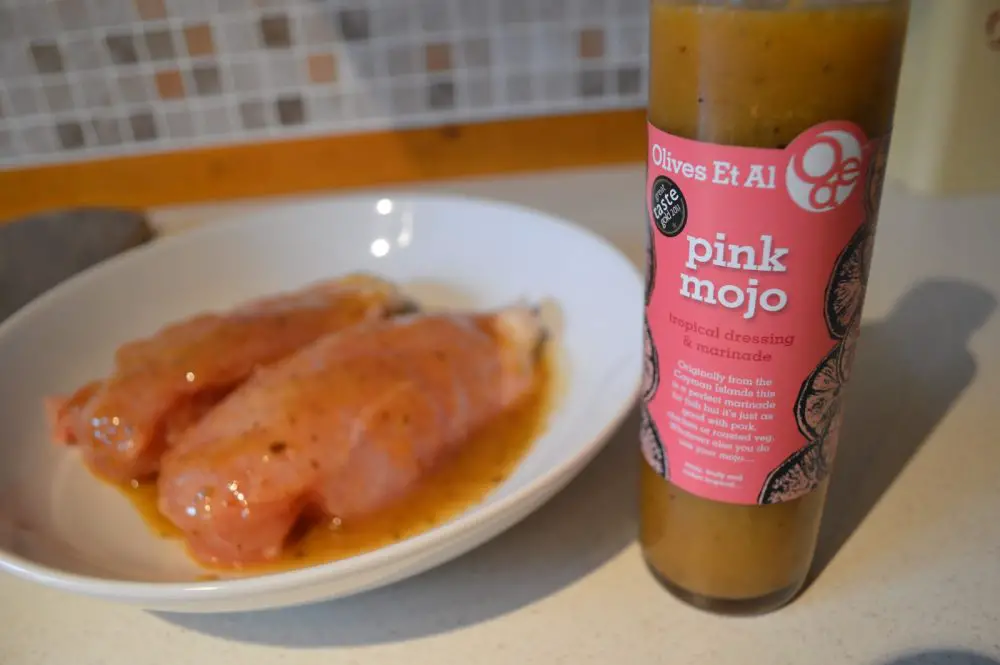 marinaded chicken in pink mojo sauce