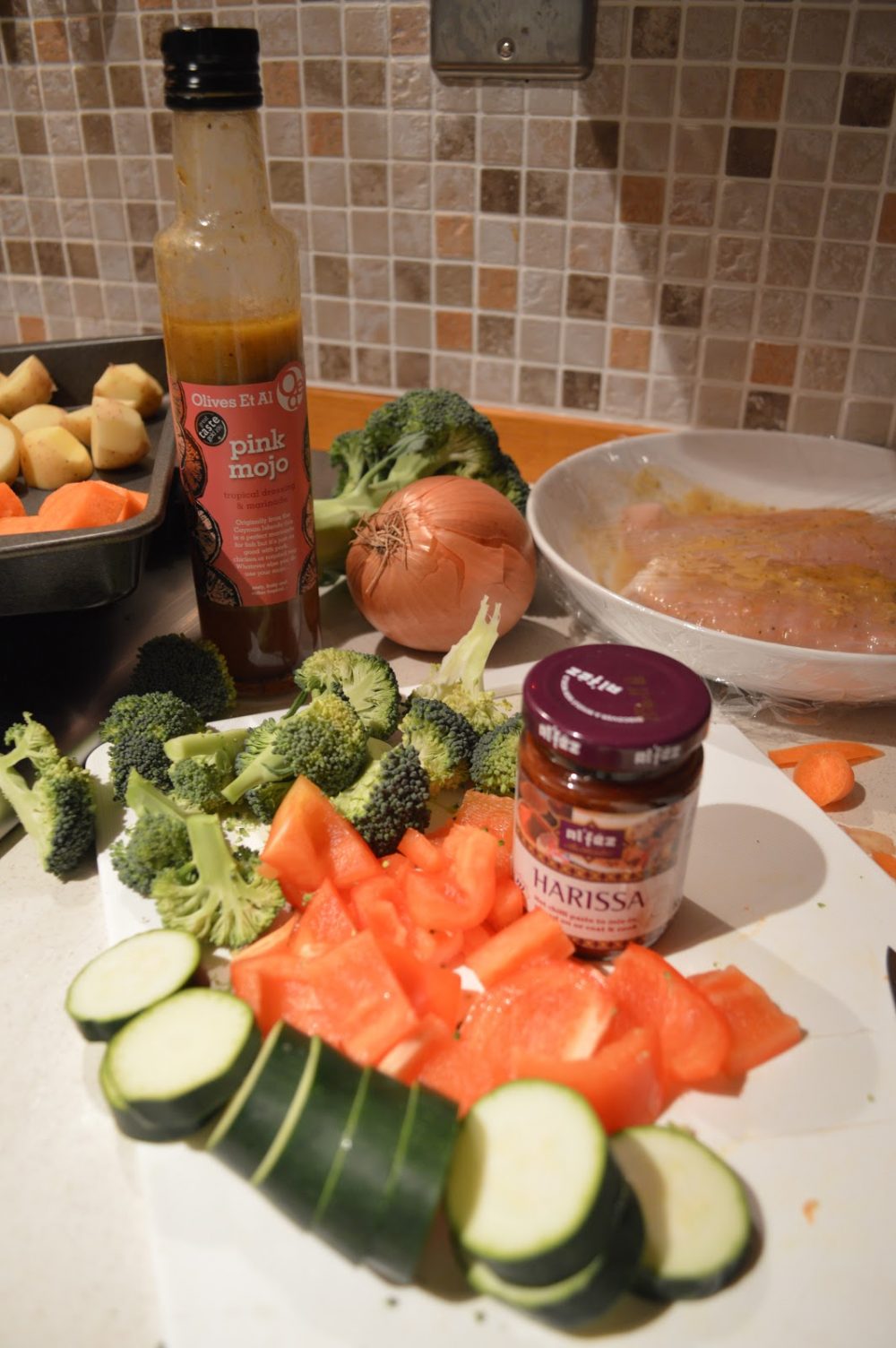 pink mojo sauce and vegetables ready for roasting