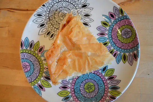 A slice of leftover cheese board pie