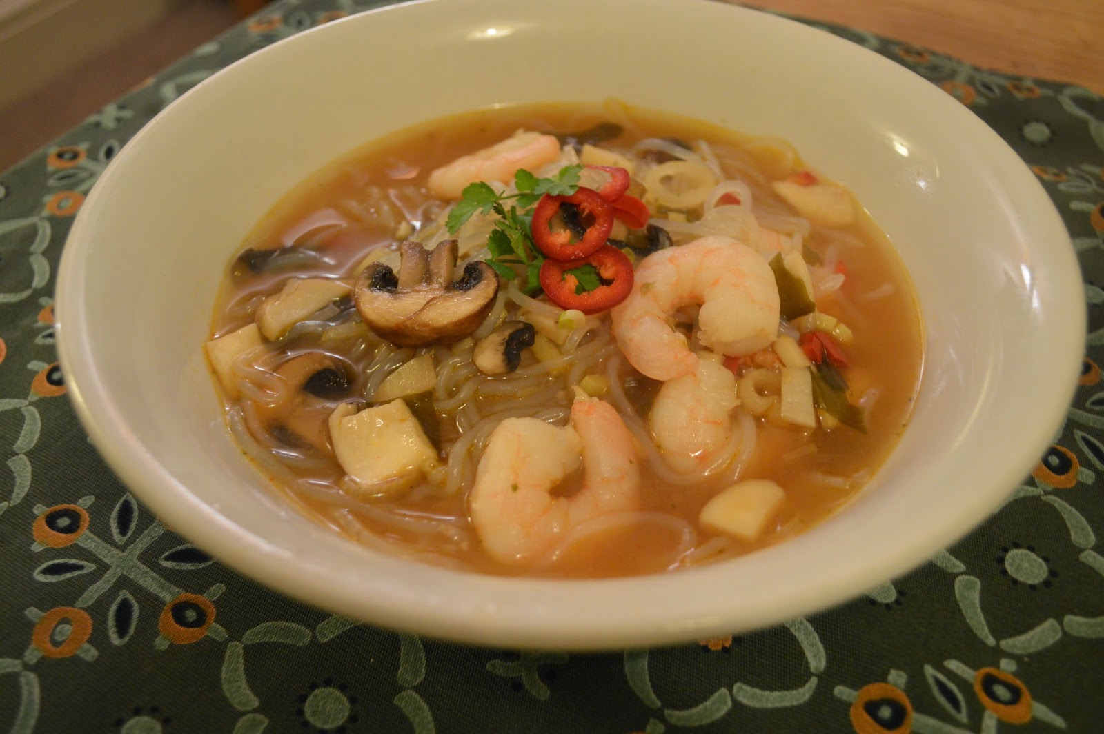 Yellow miso broth with king prawns