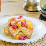 Coconut french toast with honey, apricots & raspberries