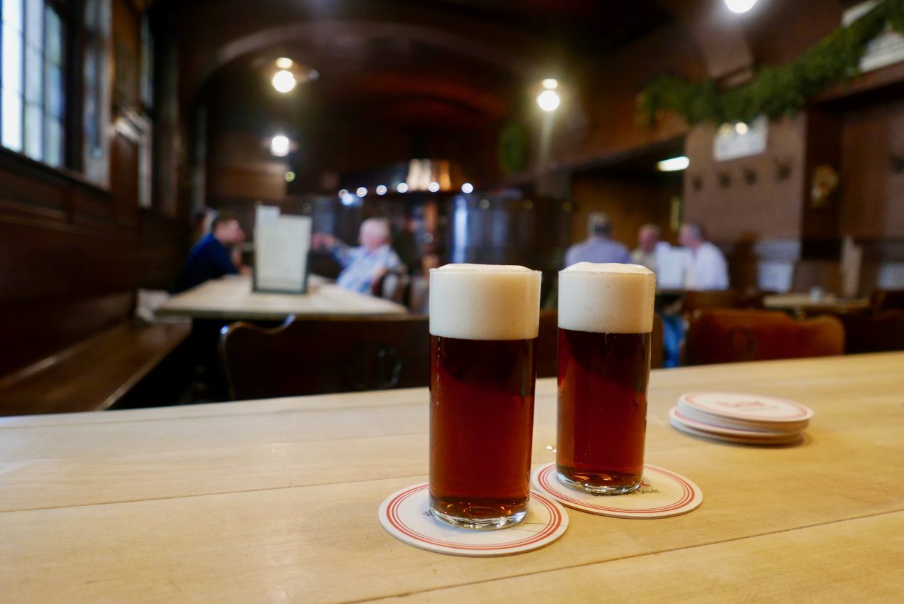 Drinking Altbier in the popular Uerige bar in Dusseldorf's old town