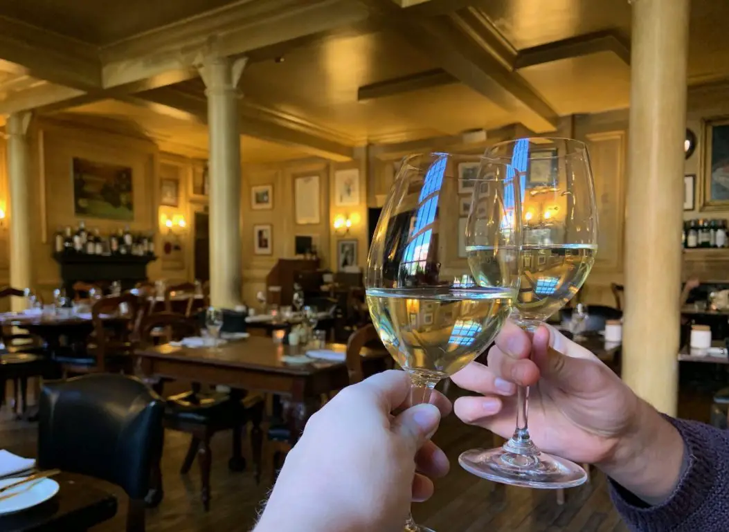 Enjoying a glass of white wine at Hotel Du Vin in Bristol