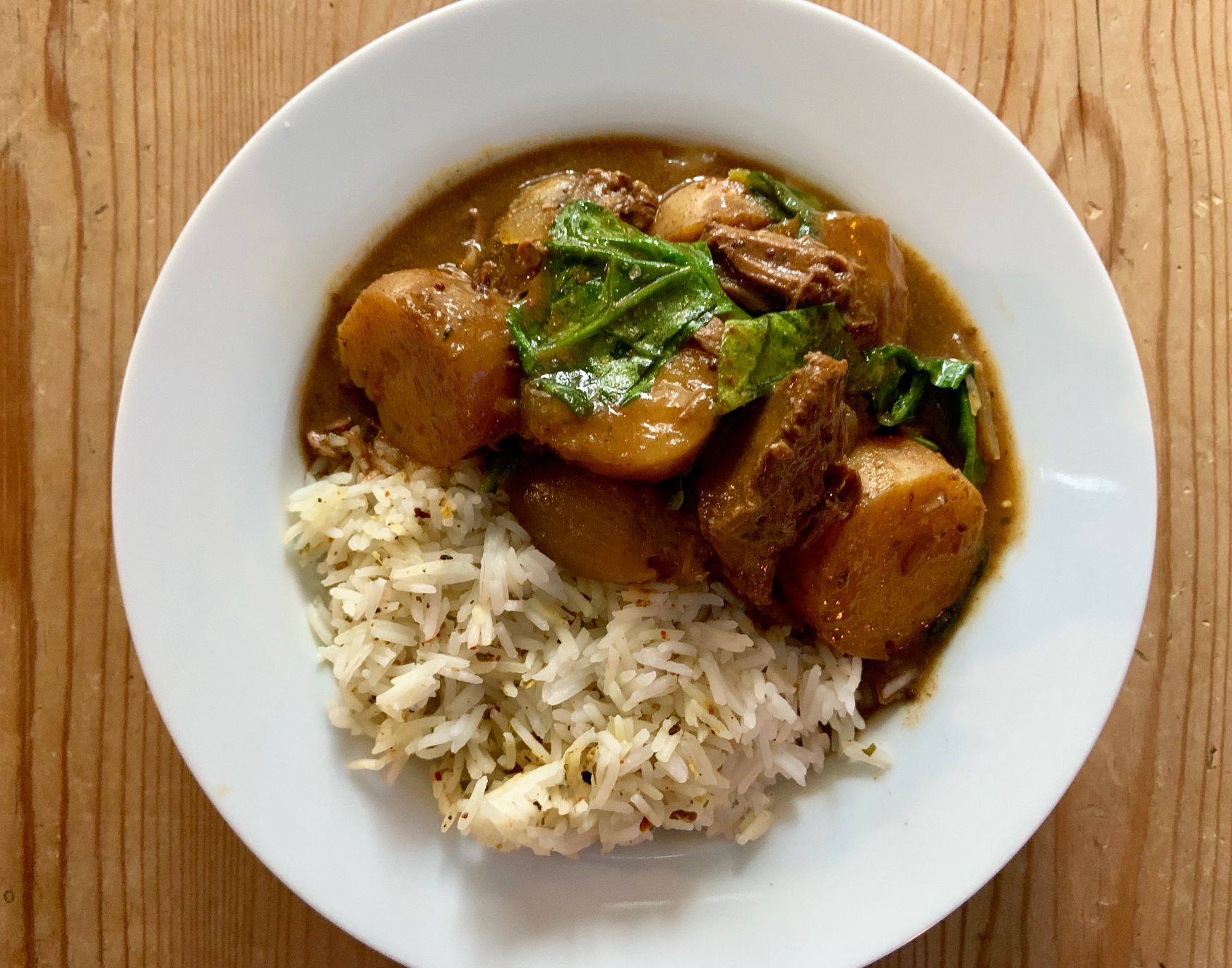 Slow cooker beef and potato curry made with fritillary butterfly beef from Farm Wilder