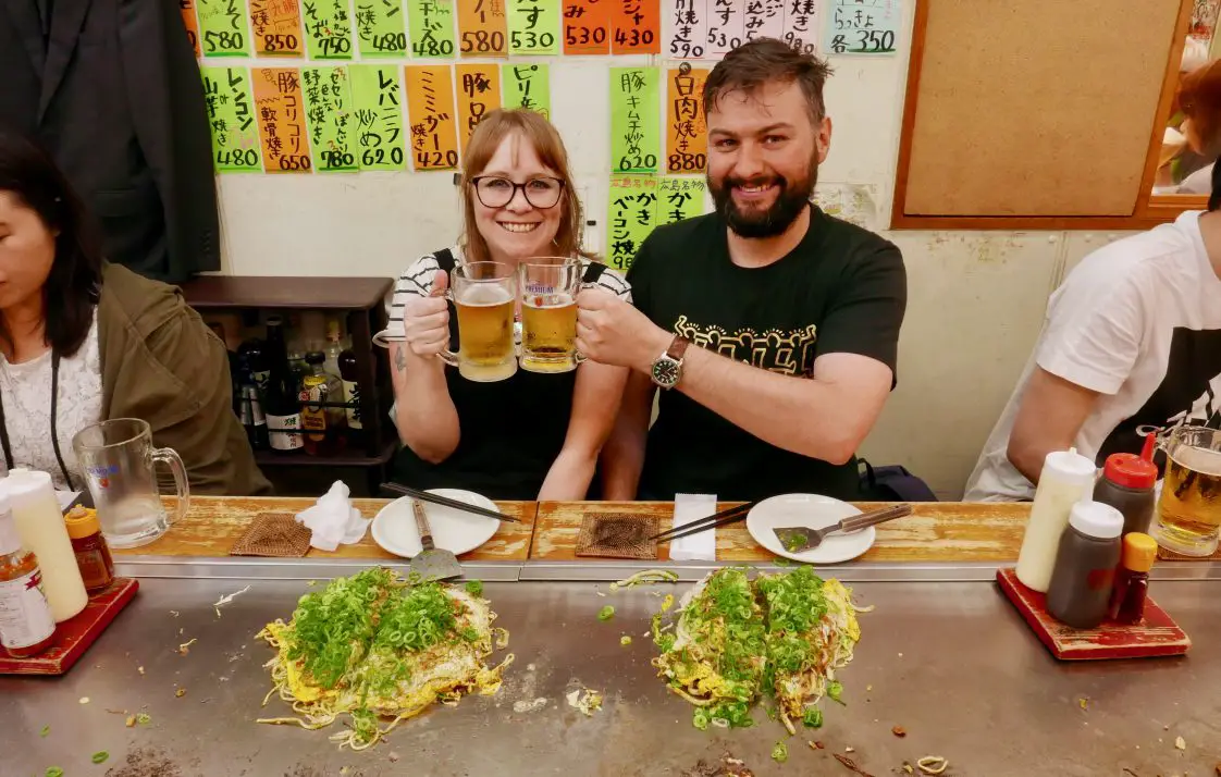 Gingey Bites enjoying a beer and Okonomiyaki in Hiroshima