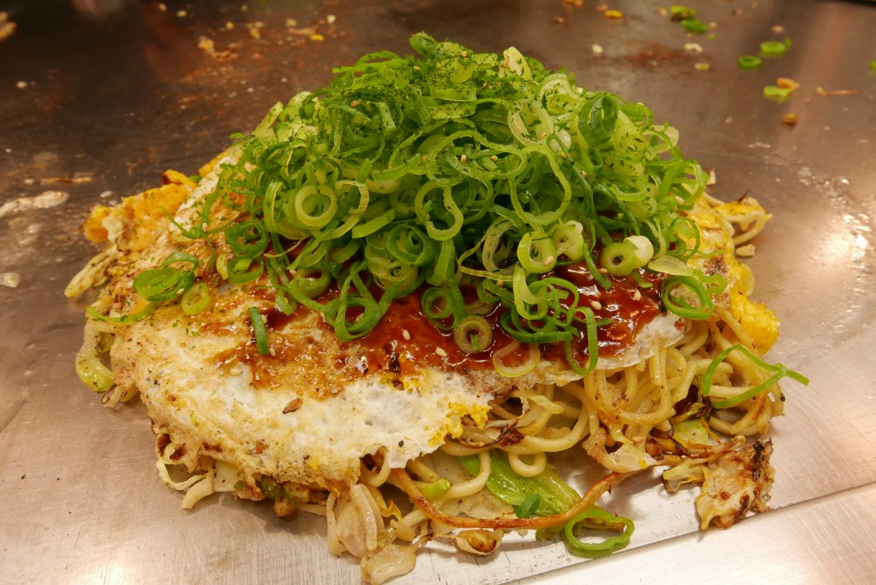 An okonomiyaki ready to eat at Okonomimura in Hiroshima