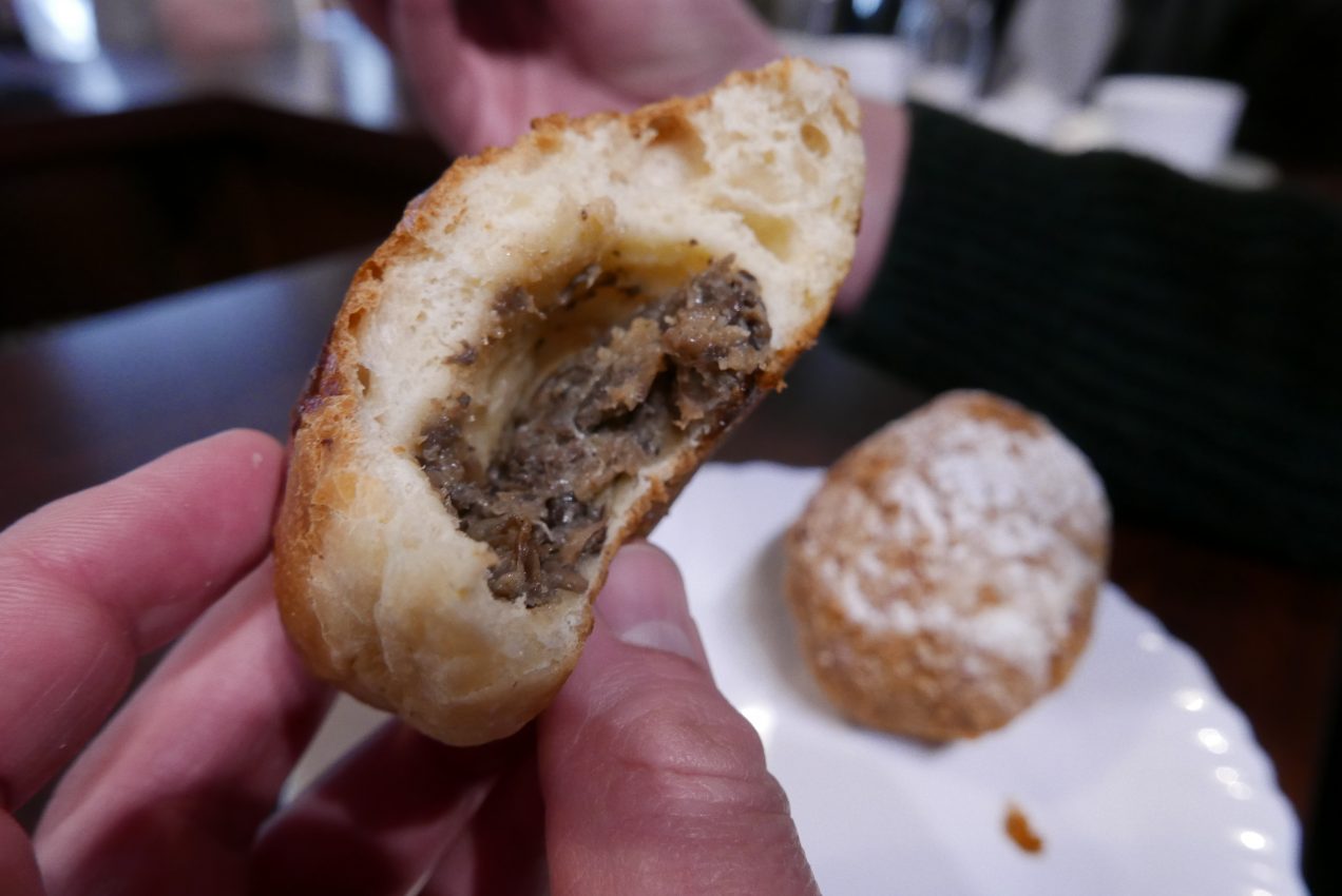 Lithuanian donut filled with mushrooms from Spurginé in Kaunas, Lithuania