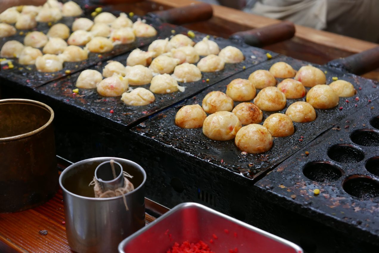 Takoyaki being made the old fashioned way at Umiya in Osaka