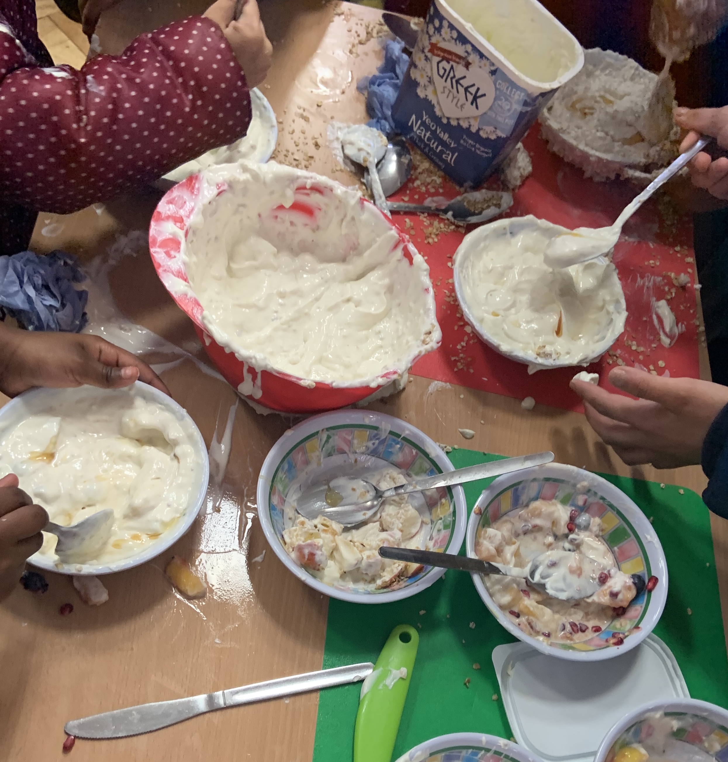 Messy yoghurt play at EverGreen Primary School