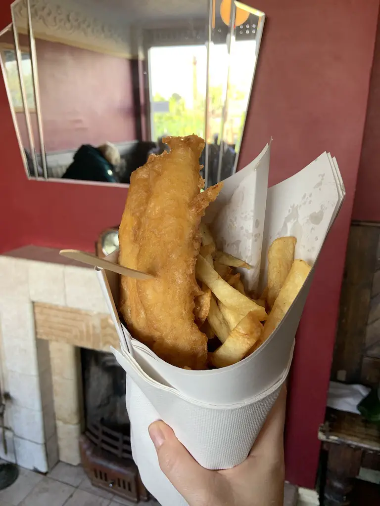 1930's style fish and chips wrapped in paper and cooked in beef dripping 