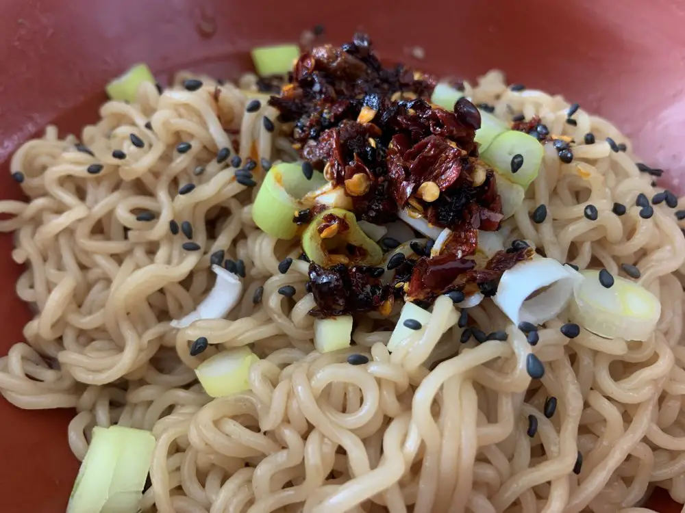 Demae Ramen Sesame noodles with spring onions and chilli oil