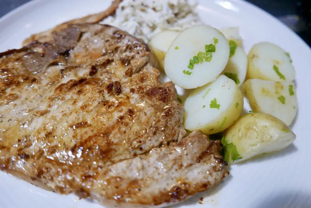 Thick cut pork chops with remoulade and new potatoes