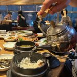 Eating traditional food at a Korean Hanjeongsik