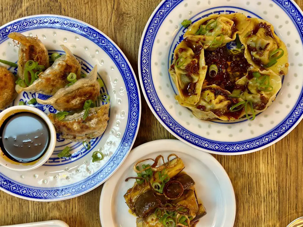 Chinese chilli wontons and dumplings on pretty blue and white china, pictured from above