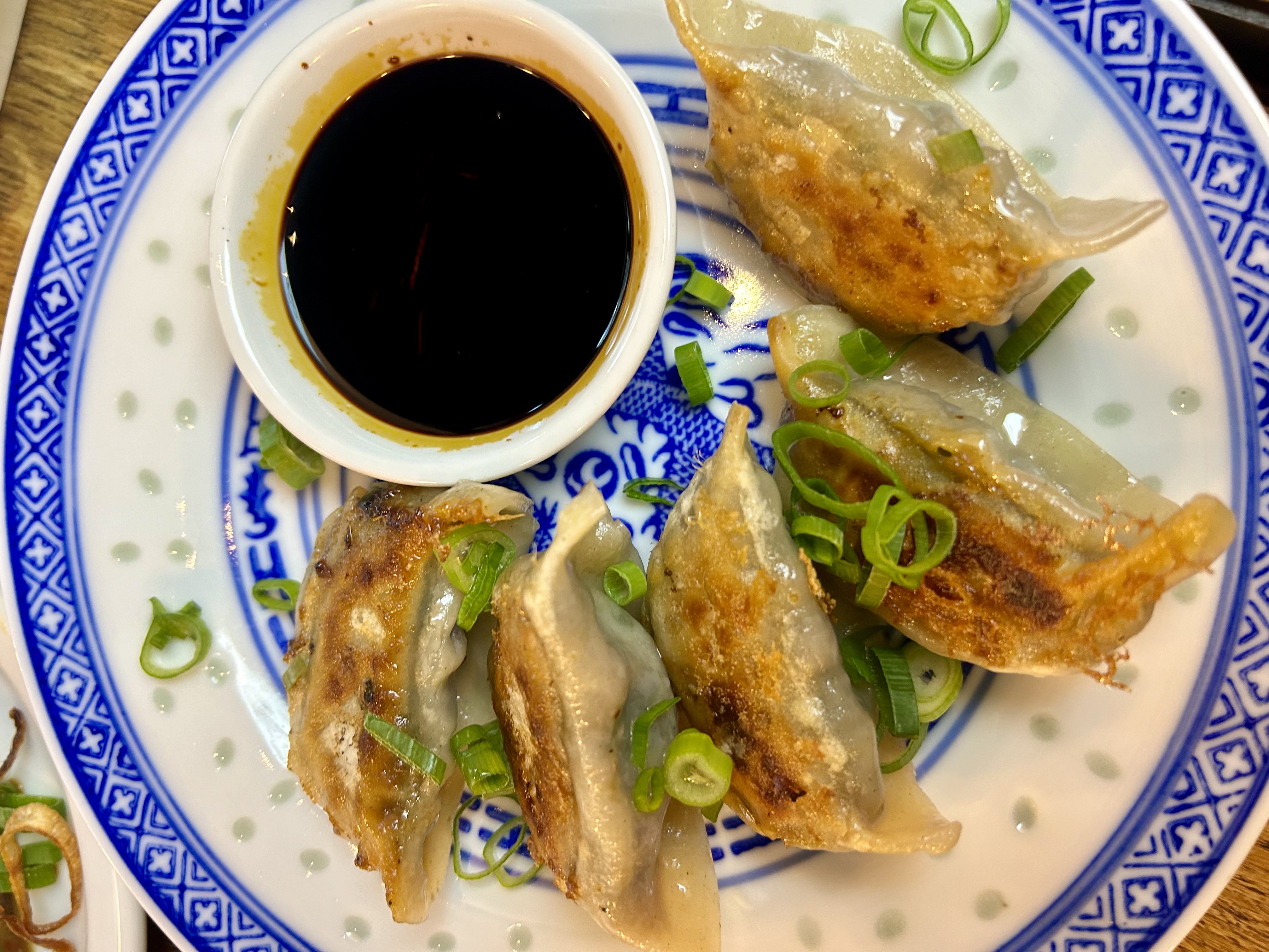 Donggu dumplings with mushroom and chinese leaf filling with a gingey soy dipping sauce