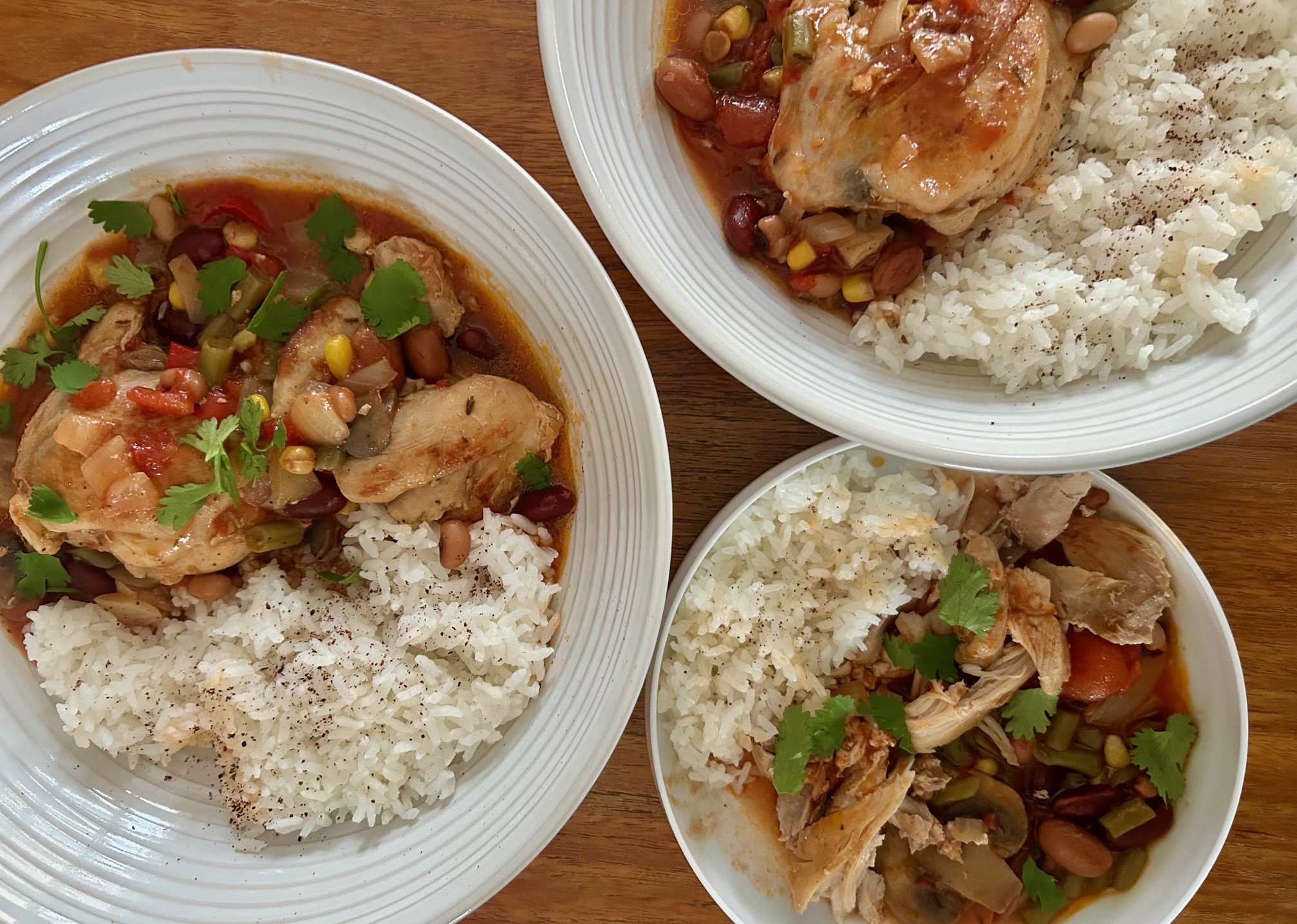 Smoky chicken and bean stew served in two adult portions and one child size portion.