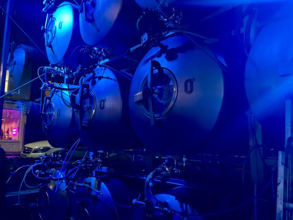 Dark blue lighting with beer brewery barrels