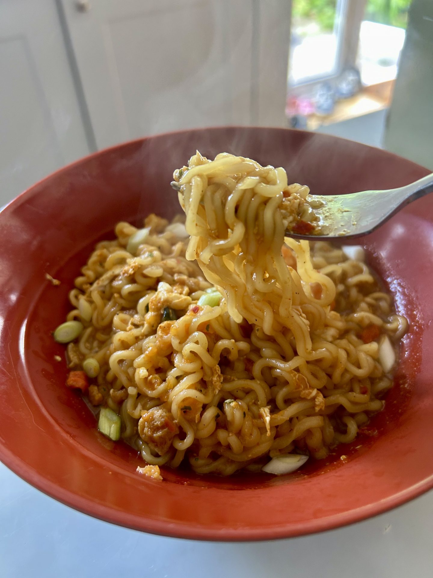 Steaming bowl of Shin Ramyun instant noodles
