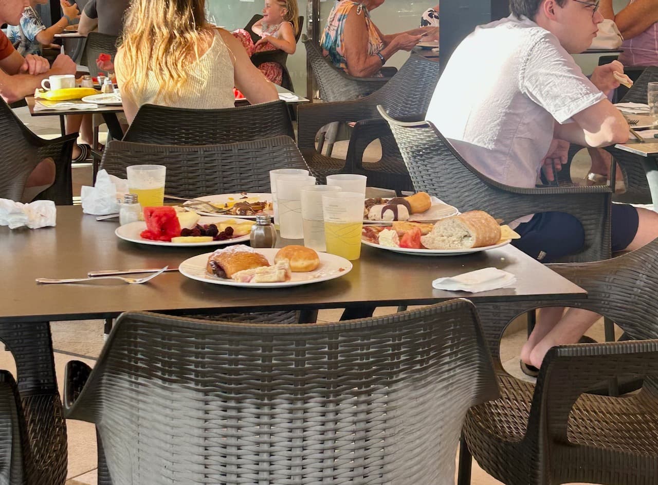 Waste food left on the table at an all inclusive restaurant
