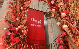The floral decor around the entrance to Jang restaurant in London's Royal Exchange.