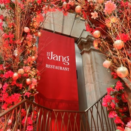 The floral decor around the entrance to Jang restaurant in London's Royal Exchange.
