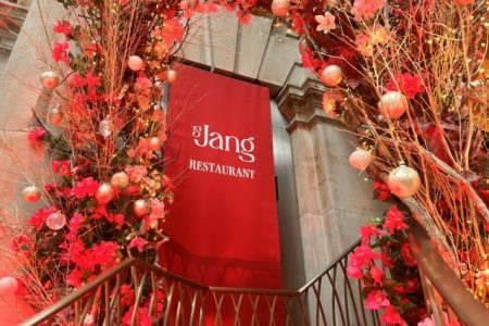 The floral decor around the entrance to Jang restaurant in London's Royal Exchange.