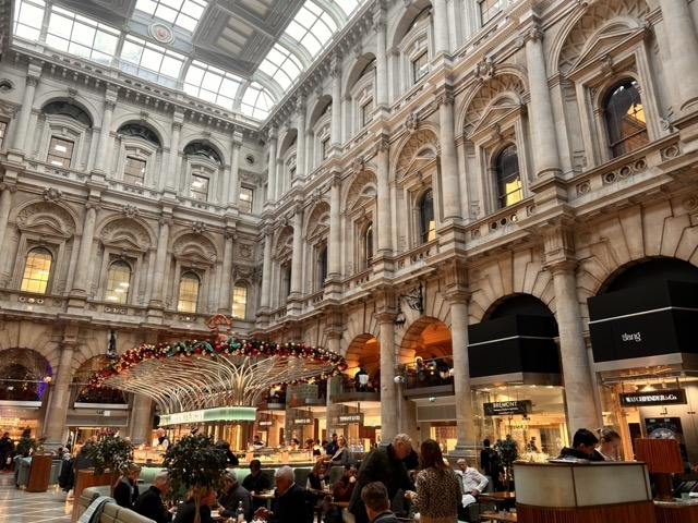 Looking out across the Royal Exchange in London with Fortnum and Mason cafe in the centre