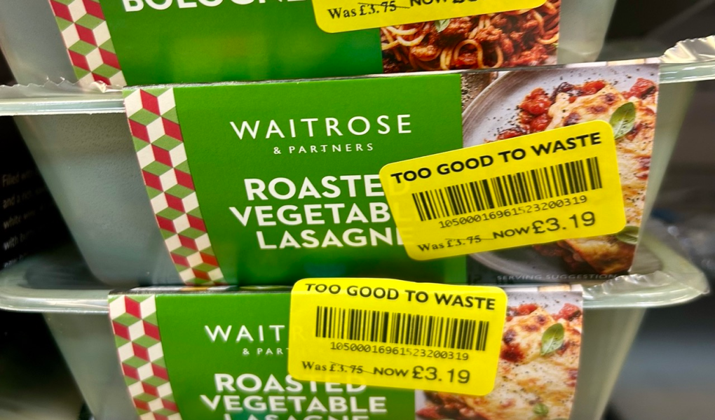 Yellow stickers on a pile of ready meals in Waitrose