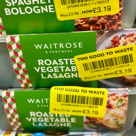 Yellow stickers on a pile of ready meals in Waitrose