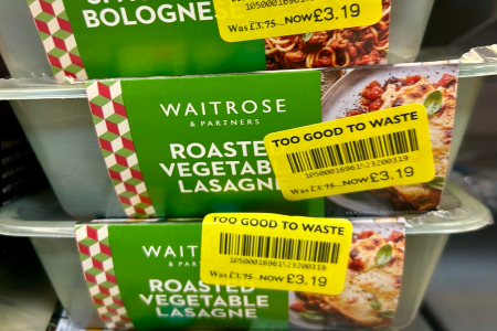 Yellow stickers on a pile of ready meals in Waitrose