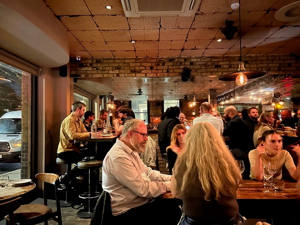 Inside a busy Flour & Grape restaurant 