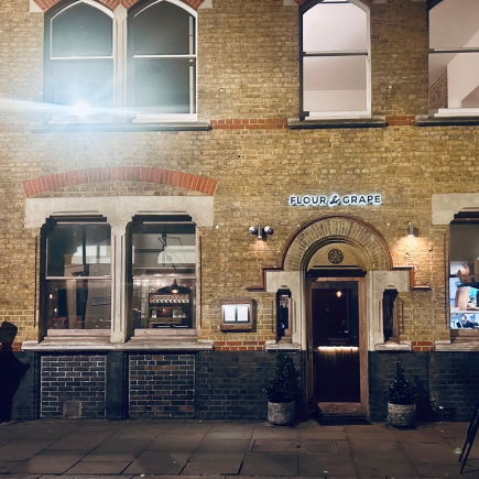 Outside the unassuming but excellent Flour and Grape in London on a winter night