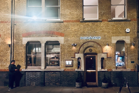 Outside the unassuming but excellent Flour and Grape in London on a winter night